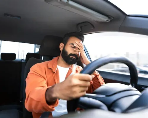 exhausted-arab-driver-man-stuck-traffic-jam-car_116547-77406